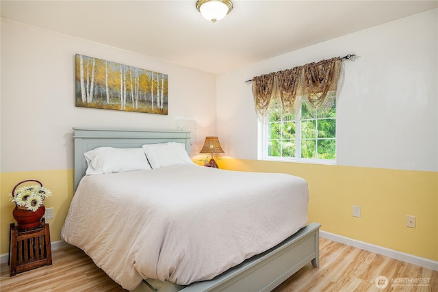 6841 NW Ranger Way, Silverdale, WA 98383 - bedroom with wood finished floors and baseboards