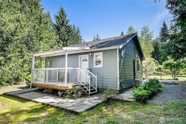 6841 NW Ranger Way, Silverdale, WA 98383 - view of front of home featuring a wooden deck and cooling unit