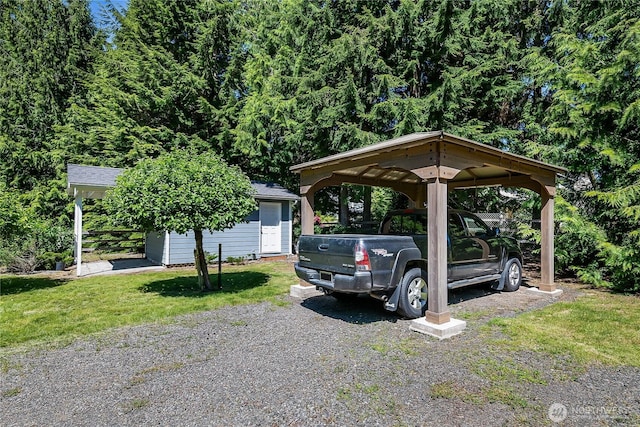 6841 NW Ranger Way, Silverdale, WA 98383 - view of parking featuring a detached carport and gravel driveway
