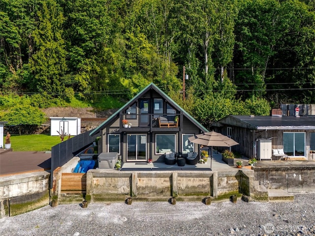 8200 Naketa Beach Walk, Mukilteo, WA 98275 - view of front of home with a wooden deck and an outbuilding