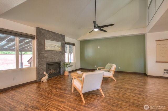 872 Albion Ave SE, Ocean Shores, WA 98569 - living area featuring baseboards, ceiling fan, healthy amount of natural light, wood finished floors, and high vaulted ceiling