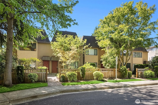 379 100th Ave NE Unit A, Bellevue, WA 98004 - multi unit property featuring a fenced front yard and mansard roof