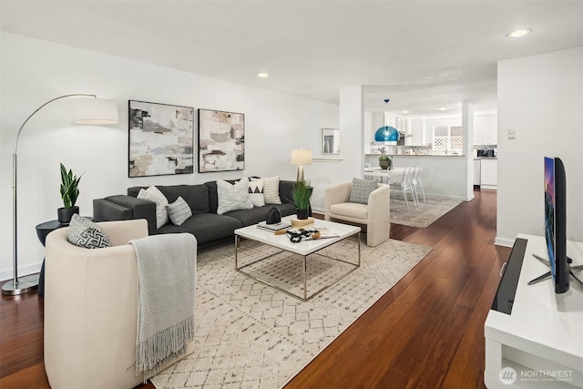 379 100th Ave NE Unit A, Bellevue, WA 98004 - living area with dark wood-style floors and recessed lighting