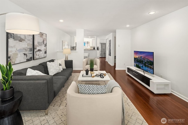379 100th Ave NE Unit A, Bellevue, WA 98004 - living room with wood finished floors, recessed lighting, and baseboards