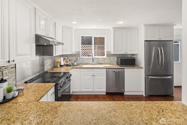 379 100th Ave NE Unit A, Bellevue, WA 98004 - kitchen with appliances with stainless steel finishes, a sink, under cabinet range hood, white cabinetry, and recessed lighting
