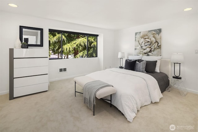 379 100th Ave NE Unit A, Bellevue, WA 98004 - bedroom with light colored carpet, baseboards, and recessed lighting