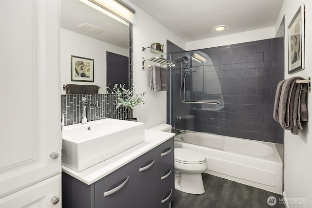 379 100th Ave NE Unit A, Bellevue, WA 98004 - bathroom featuring toilet, vanity, wood finished floors, and  shower combination