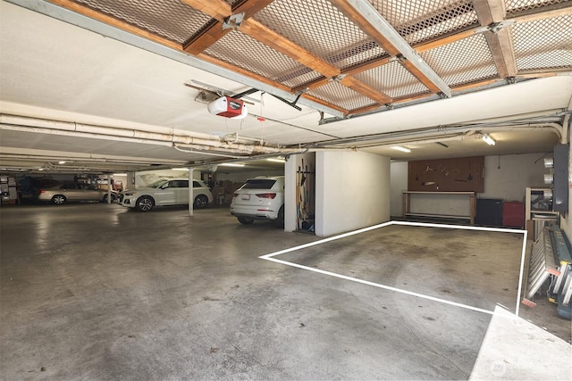 379 100th Ave NE Unit A, Bellevue, WA 98004 - parking deck featuring a garage door opener