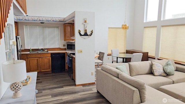 1249 E Ocean Shores Blvd SW, Ocean Shores, WA 98569 - living area with light wood-style floors and a towering ceiling