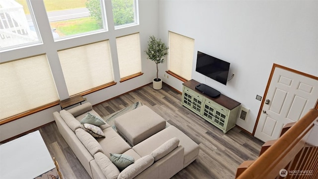 1249 E Ocean Shores Blvd SW, Ocean Shores, WA 98569 - living area featuring a towering ceiling and wood finished floors