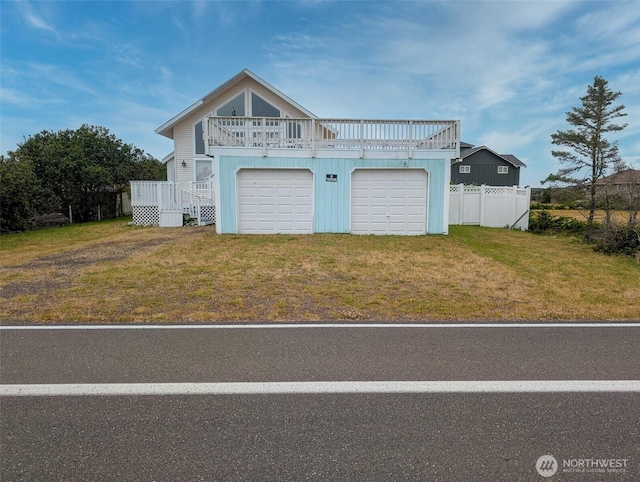 1249 E Ocean Shores Blvd SW, Ocean Shores, WA 98569 - view of front of home with a deck and driveway