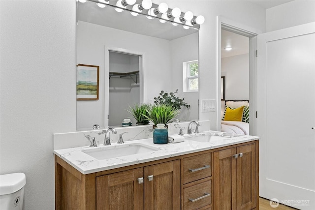 4126 19th Ave SW, Seattle, WA 98106 - ensuite bathroom featuring double vanity and toilet