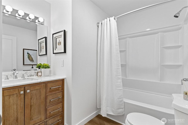 4126 19th Ave SW, Seattle, WA 98106 - full bathroom with toilet, vanity, shower / bathtub combination with curtain, baseboards, and wood finished floors