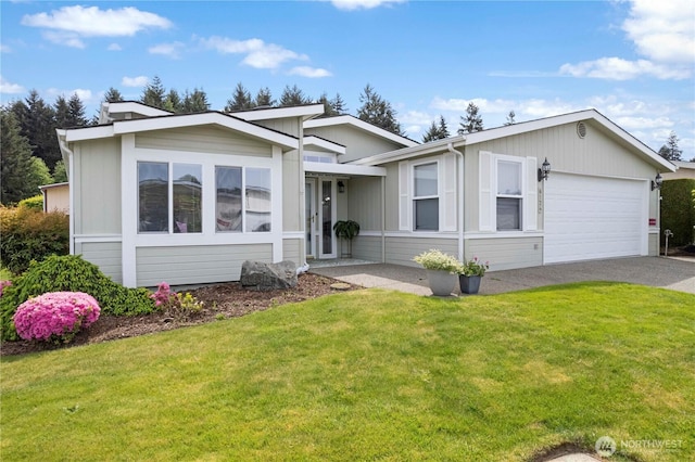 6124 91st St E, Puyallup, WA 98371 - ranch-style home with a garage, driveway, and a front lawn