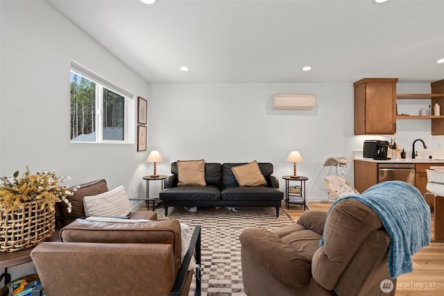 1013 Peach Rd Unit A & B, Winlock, WA 98659 - living room featuring recessed lighting, a wall mounted AC, and light wood-type flooring