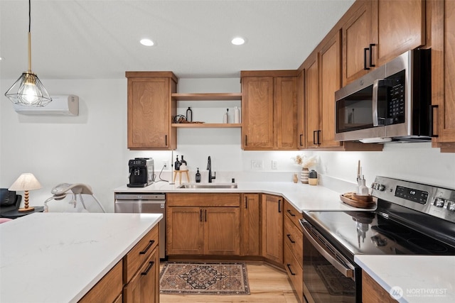 1013 Peach Rd Unit A & B, Winlock, WA 98659 - kitchen with appliances with stainless steel finishes, a sink, open shelves, brown cabinets, and recessed lighting