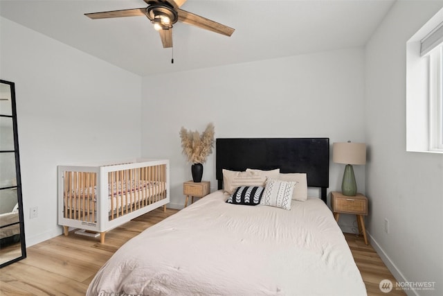 1013 Peach Rd Unit A & B, Winlock, WA 98659 - bedroom with wood finished floors, baseboards, and ceiling fan