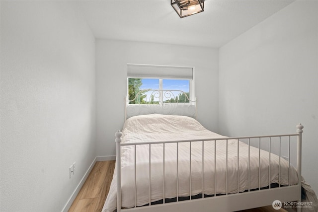 1013 Peach Rd Unit A & B, Winlock, WA 98659 - bedroom with wood finished floors and baseboards