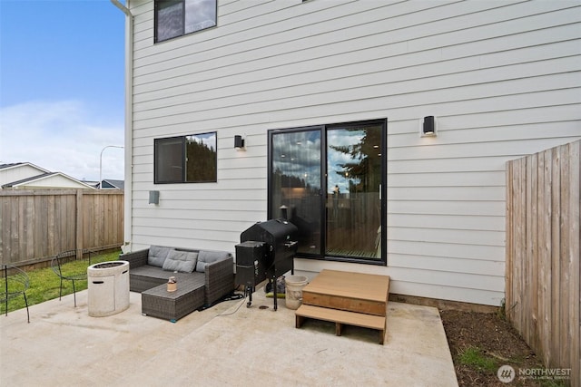 1013 Peach Rd Unit A & B, Winlock, WA 98659 - fenced backyard featuring a patio area, grilling area, and outdoor lounge area
