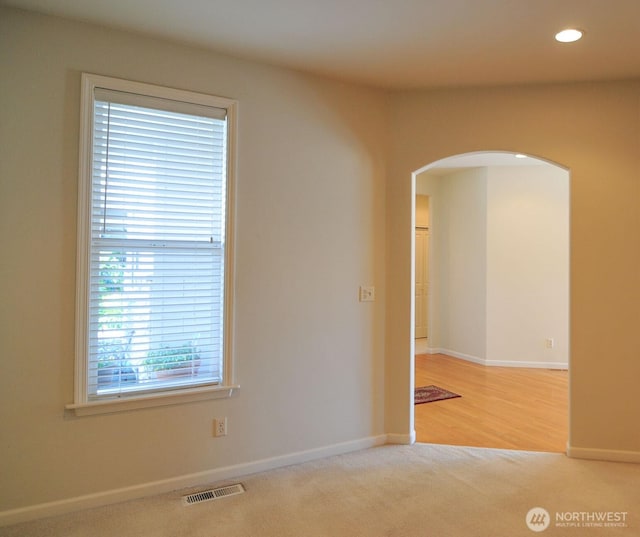 1494 Eastmont Ave Unit 58, East Wenatchee, WA 98802 - spare room with arched walkways, carpet, and recessed lighting