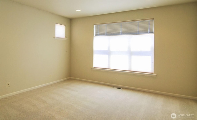 1494 Eastmont Ave Unit 58, East Wenatchee, WA 98802 - empty room featuring light colored carpet and recessed lighting