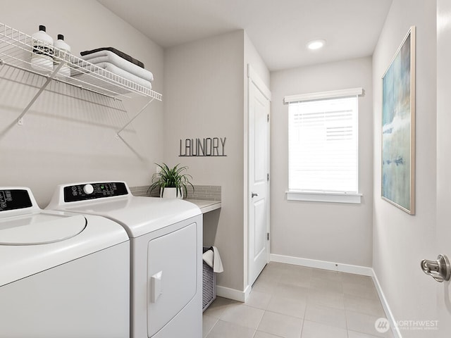 768 SE 11th Pl Lot 05, North Bend, WA 98045 - laundry room featuring washing machine and dryer, baseboards, and light tile patterned floors