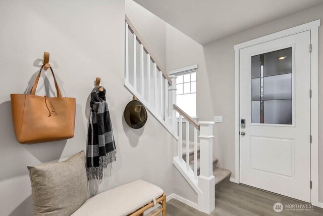 768 SE 11th Pl Lot 05, North Bend, WA 98045 - foyer entrance with wood finished floors, stairway, and baseboards