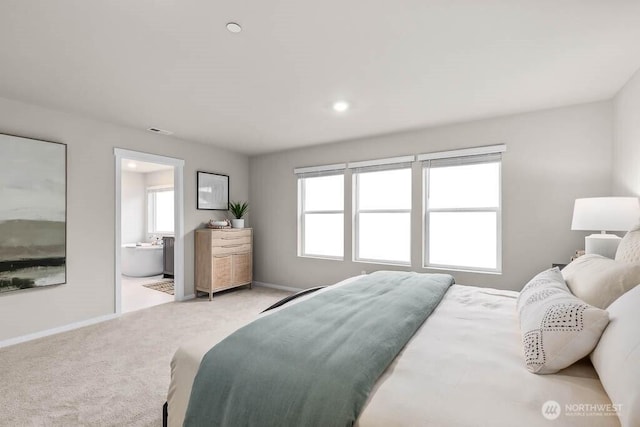 768 SE 11th Pl Lot 05, North Bend, WA 98045 - carpeted bedroom with baseboards, recessed lighting, and connected bathroom