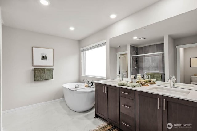 768 SE 11th Pl Lot 05, North Bend, WA 98045 - bathroom with a shower stall, double vanity, a freestanding tub, marble finish floors, and recessed lighting