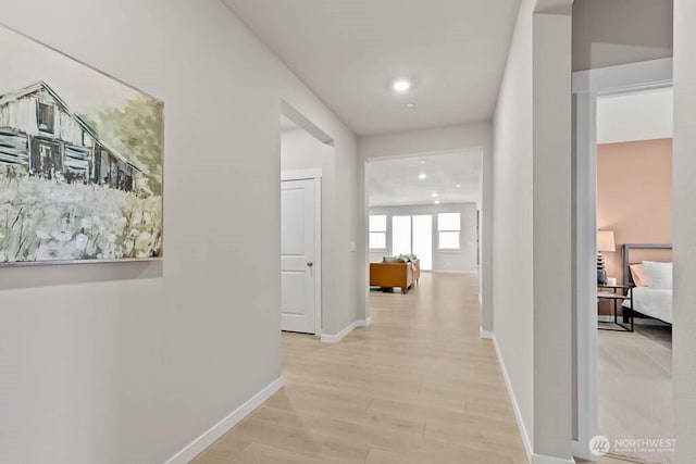 716 SE 11th Pl Unit 7, North Bend, WA 98045 - hallway featuring light wood-type flooring, baseboards, and recessed lighting