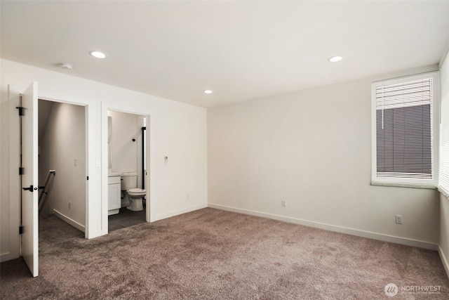 6320 41st Ave SW Unit D, Seattle, WA 98136 - unfurnished bedroom with carpet flooring, recessed lighting, baseboards, and ensuite bathroom