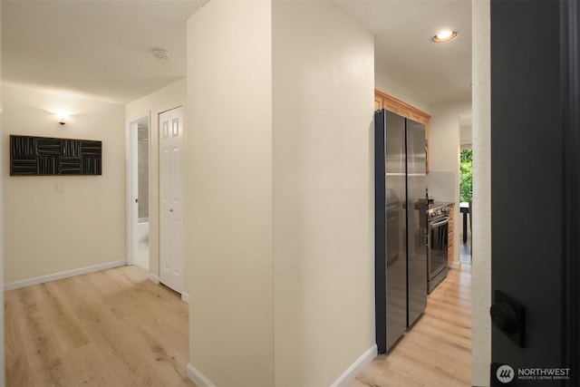 12223 NE Bel-Red Rd Unit D105, Bellevue, WA 98005 - hall featuring light wood-style flooring, baseboards, and recessed lighting