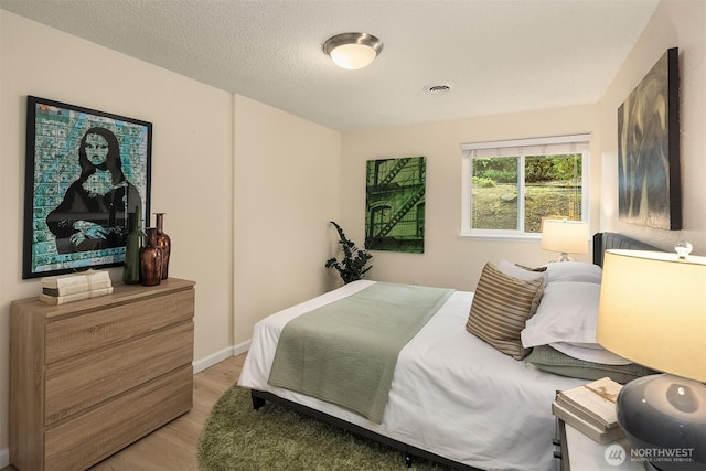 12223 NE Bel-Red Rd Unit D105, Bellevue, WA 98005 - bedroom featuring light wood-style floors