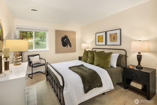 12223 NE Bel-Red Rd Unit D105, Bellevue, WA 98005 - bedroom featuring light wood finished floors