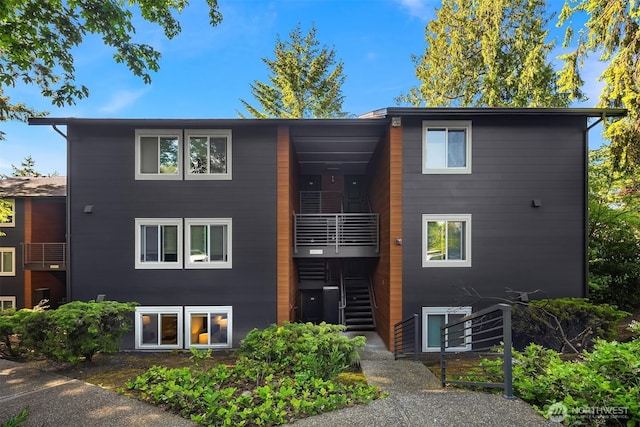 12223 NE Bel-Red Rd Unit D105, Bellevue, WA 98005 - view of building exterior featuring stairway