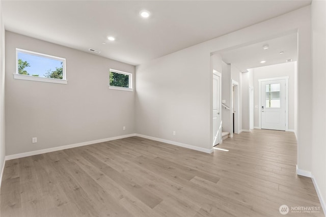 3822 98th Avenue Ct E Unit 9, Edgewood, WA 98371 - spare room with plenty of natural light, light wood-style floors, and recessed lighting