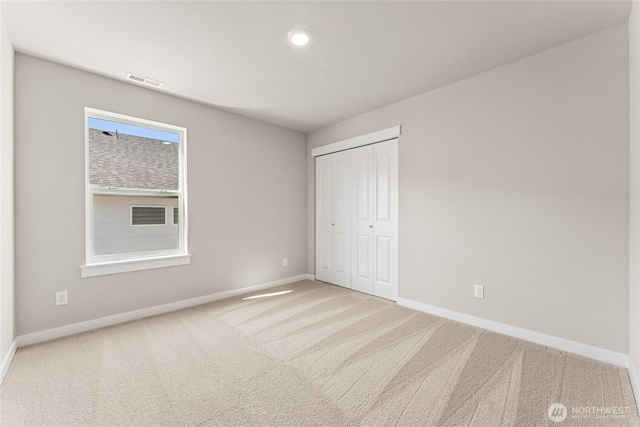 3822 98th Avenue Ct E Unit 9, Edgewood, WA 98371 - unfurnished bedroom with carpet and a closet
