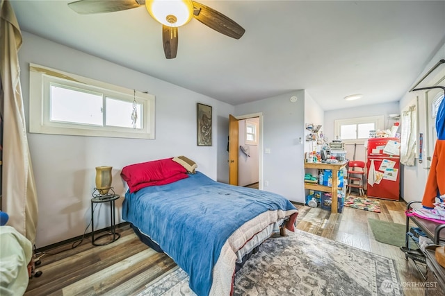 8495 Williams Rd E, Wilbur, WA 99185 - bedroom featuring wood finished floors and a ceiling fan