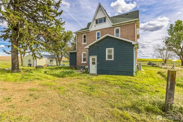 8495 Williams Rd E, Wilbur, WA 99185 - rear view of house featuring brick siding