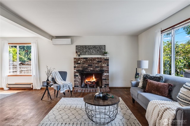 11816 40th Ave S, Tukwila, WA 98168 - living room with a wall unit AC, plenty of natural light, wood finished floors, and a brick fireplace