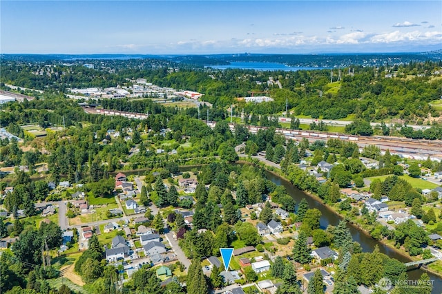 11816 40th Ave S, Tukwila, WA 98168 - aerial perspective of suburban area featuring a nearby body of water and a tree filled landscape
