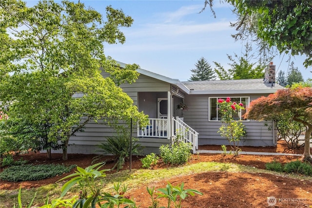 11816 40th Ave S, Tukwila, WA 98168 - view of front of house with a chimney