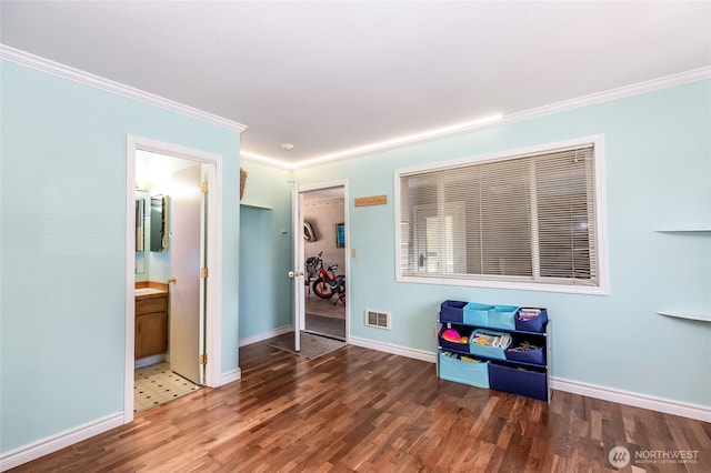 250 Tucker Ave Unit 22, Friday Harbor, WA 98250 - spare room featuring crown molding, wood finished floors, and baseboards