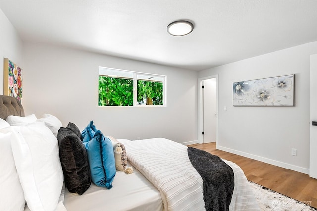 1231 121st Pl SE, Everett, WA 98208 - bedroom with light wood-style floors and baseboards