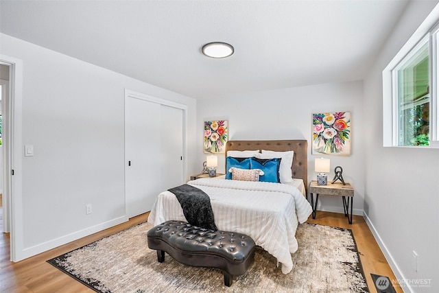 1231 121st Pl SE, Everett, WA 98208 - bedroom featuring light wood-type flooring and baseboards