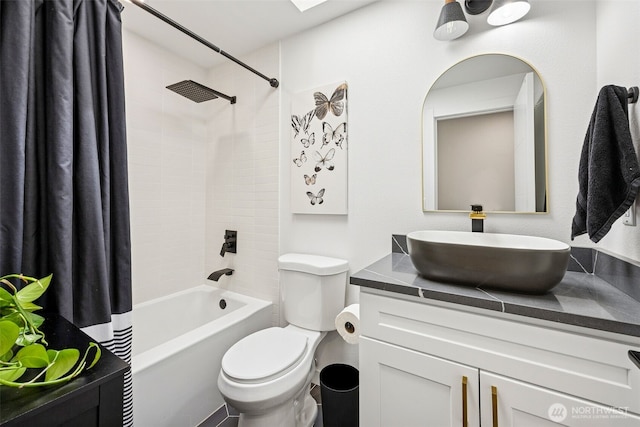 21710 104th Ave E, Graham, WA 98338 - bathroom with vanity, shower / tub combo, and toilet