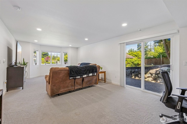 21710 104th Ave E, Graham, WA 98338 - living area with plenty of natural light, light colored carpet, baseboards, and recessed lighting