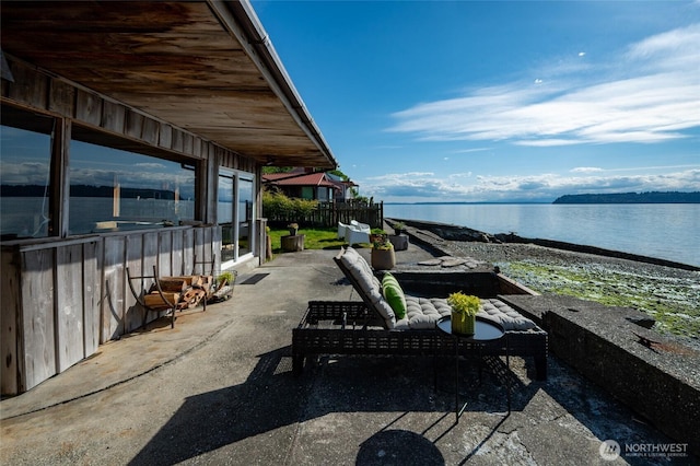 8204 Naketa Beach Walk, Mukilteo, WA 98275 - view of patio / terrace with a water view and an outdoor hangout area