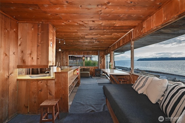 8204 Naketa Beach Walk, Mukilteo, WA 98275 - sunroom / solarium with a water view and a sink