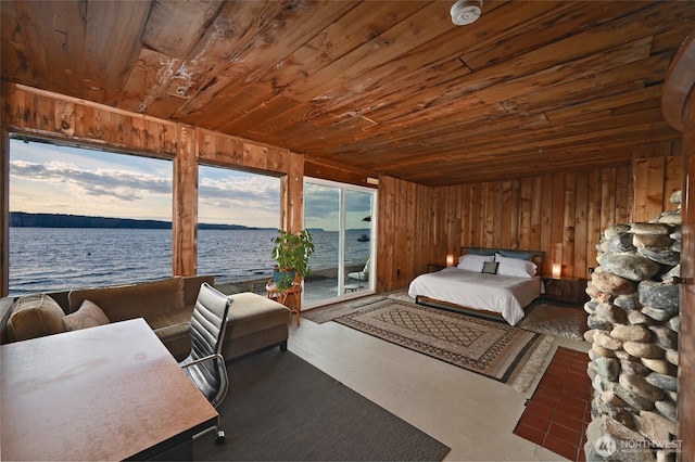 8204 Naketa Beach Walk, Mukilteo, WA 98275 - bedroom featuring wood ceiling, a water view, access to exterior, and wooden walls